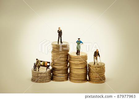 People of various social groups on pile of coins. Financial concept 87977963