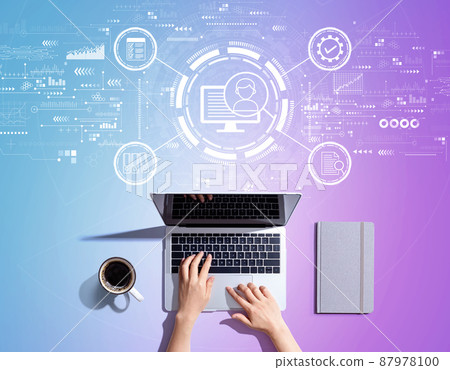 Document management system concept with person using a laptop Document management system concept with person using a laptop 87978100