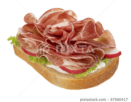 Toasted bread with coppa ham isolated on white background Toasted bread with coppa ham isolated on white background 87980417