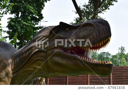 Tyrannosaurus - prehistoric era dinosaur showing his toothy mouth 87981838