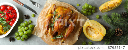 Christmas roast turkey concept on gray textured table 87982147