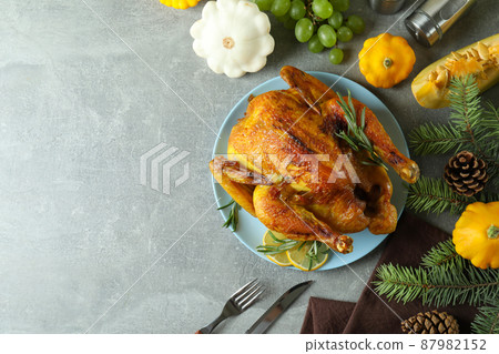 Thanksgiving Day roast turkey concept on gray textured table Thanksgiving Day roast turkey concept on gray textured table 87982152