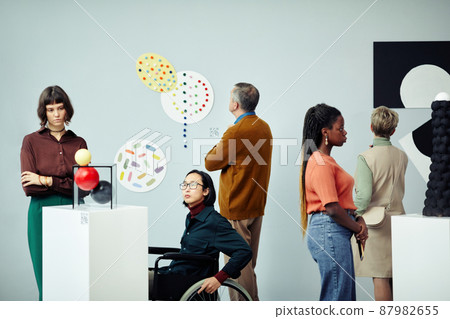 Group of People At Exhibition In Museum 87982655