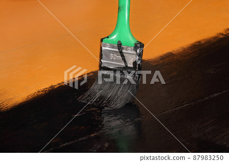 Home renovation, yellow floor painting to black color Home renovation, yellow floor painting to black color 87983250