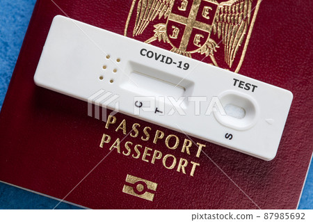 COVID-19 serological rapid diagnostic test on a Serbia passport COVID-19 serological rapid diagnostic test on a Serbia passport 87985692