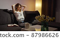Tired freelancer finishes her online work on laptop. 87986626
