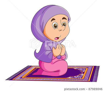 The little girl is sitting on the carpet and praying  87989846