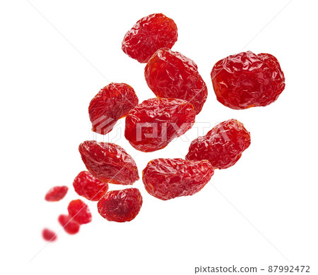 Dried dogwood berries levitate on a white background 87992472