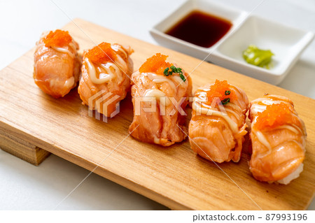 grilled salmon sushi on plate 87993196