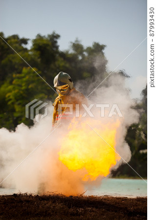 Firefighter with fire and suit for protect fire fighter for training firefighters. 87993430