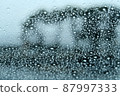 Material for rainy days in the outside view seen through the glass with raindrops 87997333