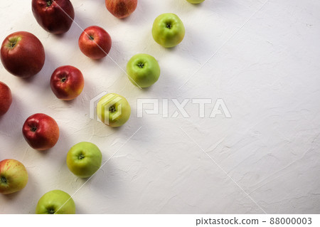 Green and red apples close up. Juicy fruits. Useful snack. Vegetarian food. Delicious, healthy snack. Vitamins, microelements. Fat burning. copy space banner 88000003