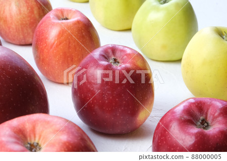 Green and red apples close up. Juicy fruits. Useful snack. Vegetarian food. Delicious, healthy snack. Vitamins, microelements. Fat burning. copy space banner 88000005