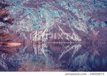 Mountain lake with reflection in the water Mountain lake with reflection in the water 88000655