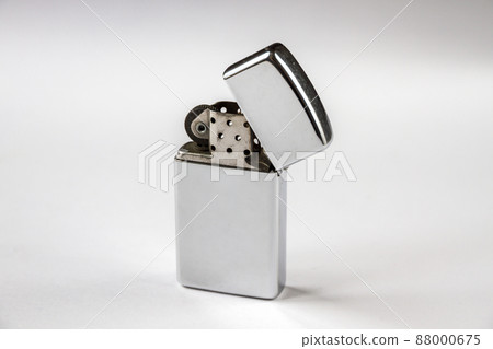 Old vintage lighter isolated on a white background Old vintage lighter isolated on a white background 88000675