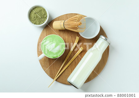 Matcha latte and accessories for making on white background 88001001