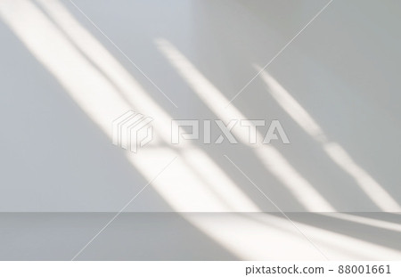 Gray cement wall in empty room with light and shadow. Gray cement wall in empty room with light and shadow. 88001661