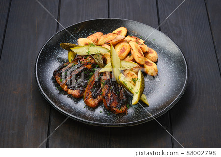 Roasted pork belly slices with gnocchi Roasted pork belly slices with gnocchi 88002798