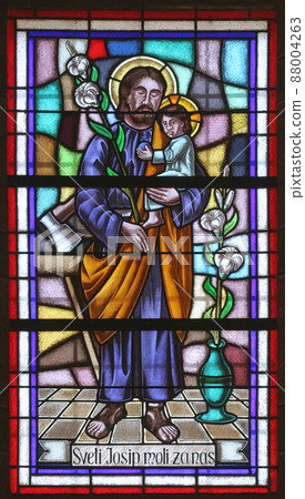 Saint Joseph holding baby Jesus 88004263