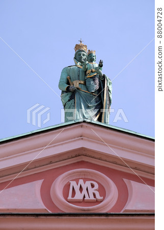 Madonna and Child at the top of the Franciscan Church of the Annunciation on Preseren Square in Ljubljana, Slovenia 88004728