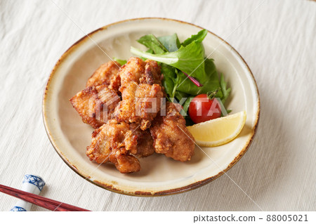 Fried chicken served on a plate Fried chicken served on a plate 88005021