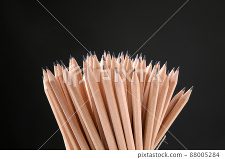 Bunch of pencils isolated on black 88005284