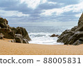 High Tides Coming on to the Rocky Shores of Costa Brava in Spain, cloudy weather 88005831