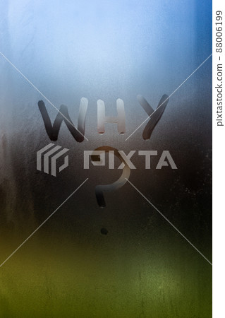 the question who written by finger on wet glass with blurred lights in background the question who written by finger on wet glass with blurred lights in background 88006199