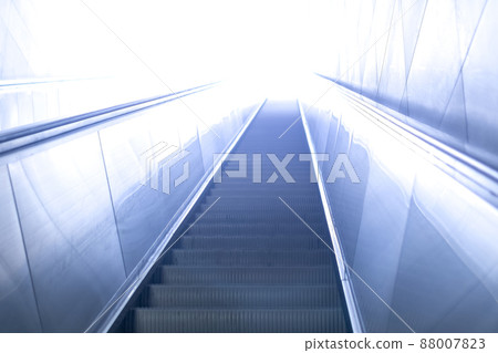 escalator leads somewhere to the light 88007823