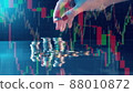 Multilayered display with stock charts and a pile of coins 88010872