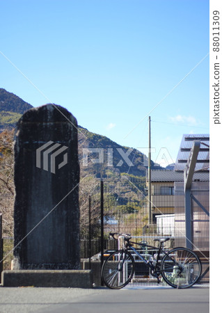 Bicycle and stone monument Bicycle and stone monument 88011309