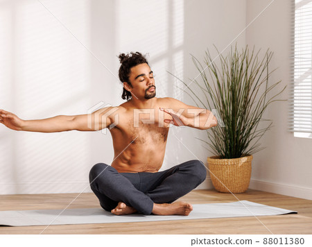 Calm African American man meditating in morning 88011380