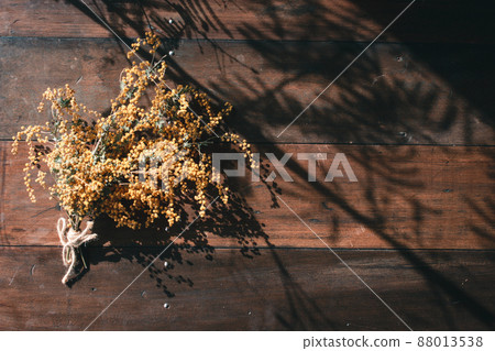 Background image material of mimosa and old wood cafe table 88013538
