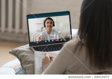 Indian woman talks to university mate, studying together use videocall 88014872