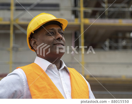 Indian engineer or construction site manager at work Indian engineer or construction site manager at work 88015550