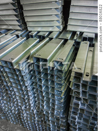 full frame view on stacks of profile bent sheet metal parts 88016822