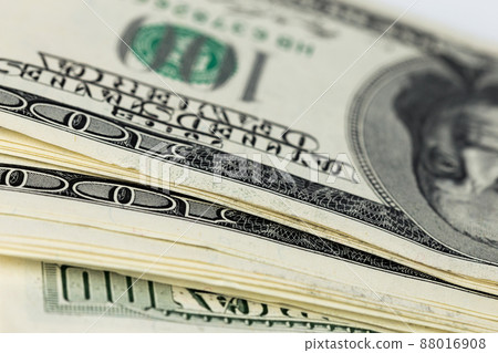 a skewed stack of old us dollar banknotes - close shot 88016908