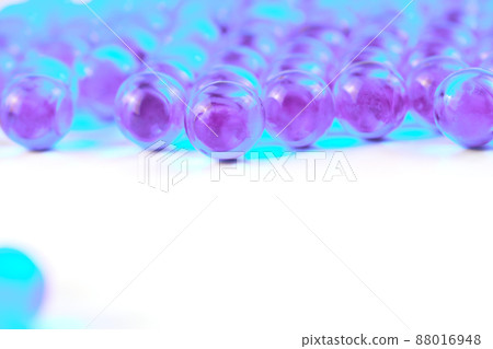 cyan spherical ball capsules with selective focus isolated on white background cyan spherical ball capsules with selective focus isolated on white background 88016948