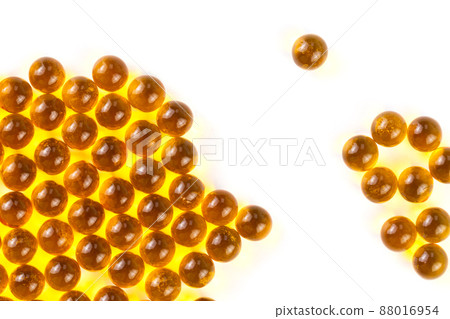 orange spherical ball capsules of fish oil selective focus isolated on white background orange spherical ball capsules of fish oil selective focus isolated on white background 88016954