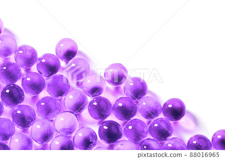 proton purple spherical ball capsules with selective focus isolated on white background proton purple spherical ball capsules with selective focus isolated on white background 88016965
