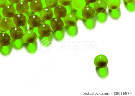 ufo green spherical ball capsules with selective focus isolated on white background ufo green spherical ball capsules with selective focus isolated on white background 88016974