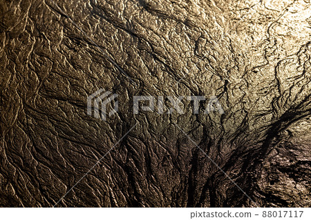 abstract mud background with water washout trails and selective focus 88017117