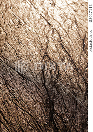 abstract mud background with water washout trails and selective focus 88017118