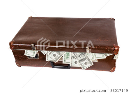 old closed brown suitcase full of hundred dollar banknotes isolated on white background old closed brown suitcase full of hundred dollar banknotes isolated on white background 88017149
