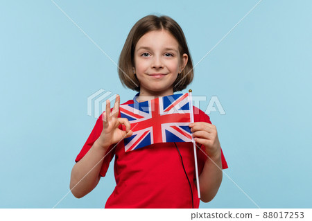 Child holding UK flag 88017253