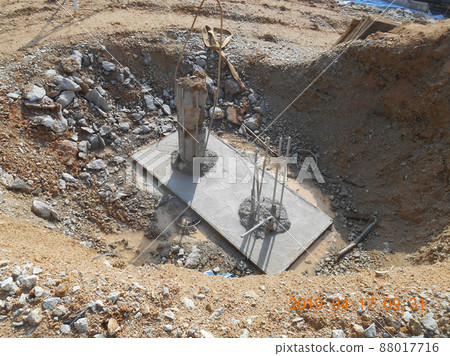 SELANGOR, MALAYSIA -JULY 4, 2021: The concrete pile cap and column stump are under construction at the construction site. Both are part of the building's foundation system. SELANGOR, MALAYSIA -JULY 4, 2021: The concrete pile cap and column stump are under construction at the construction site. Both are part of the building's foundation system. 88017716