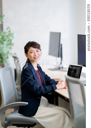 A woman working A woman working 88018039