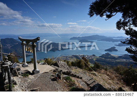 Torii of Kuraoka Shrine enshrined in the highest peak of the Amakusa Islands Torii of Kuraoka Shrine enshrined in the highest peak of the Amakusa Islands 88018467