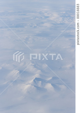 Aerial view of snow-capped mountains 88018883