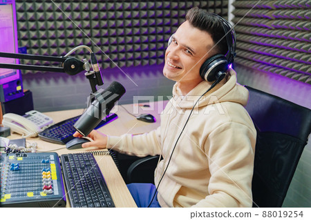 funny and emotional radio host with headphones on fun live streaming funny and emotional radio host with headphones on fun live streaming 88019254